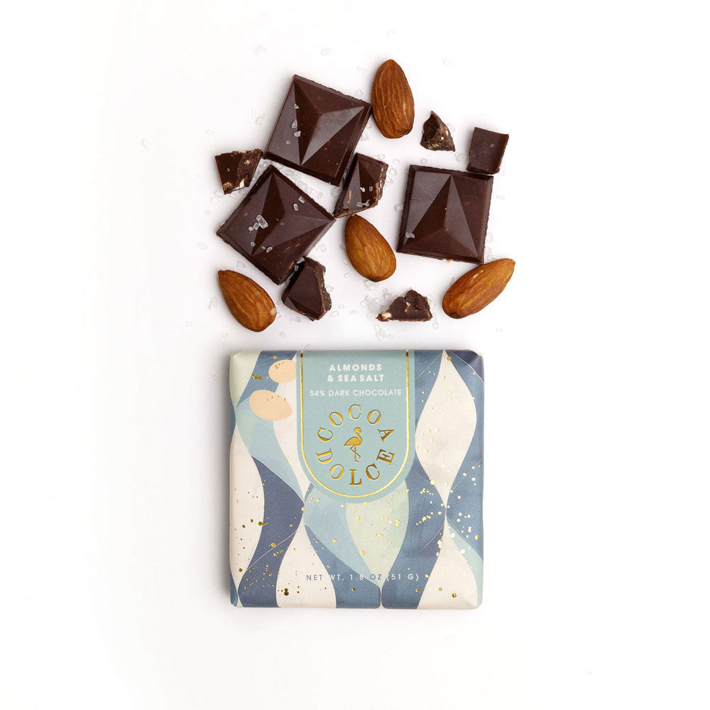 54% bittersweet chocolate almond bar styled with roasted almonds