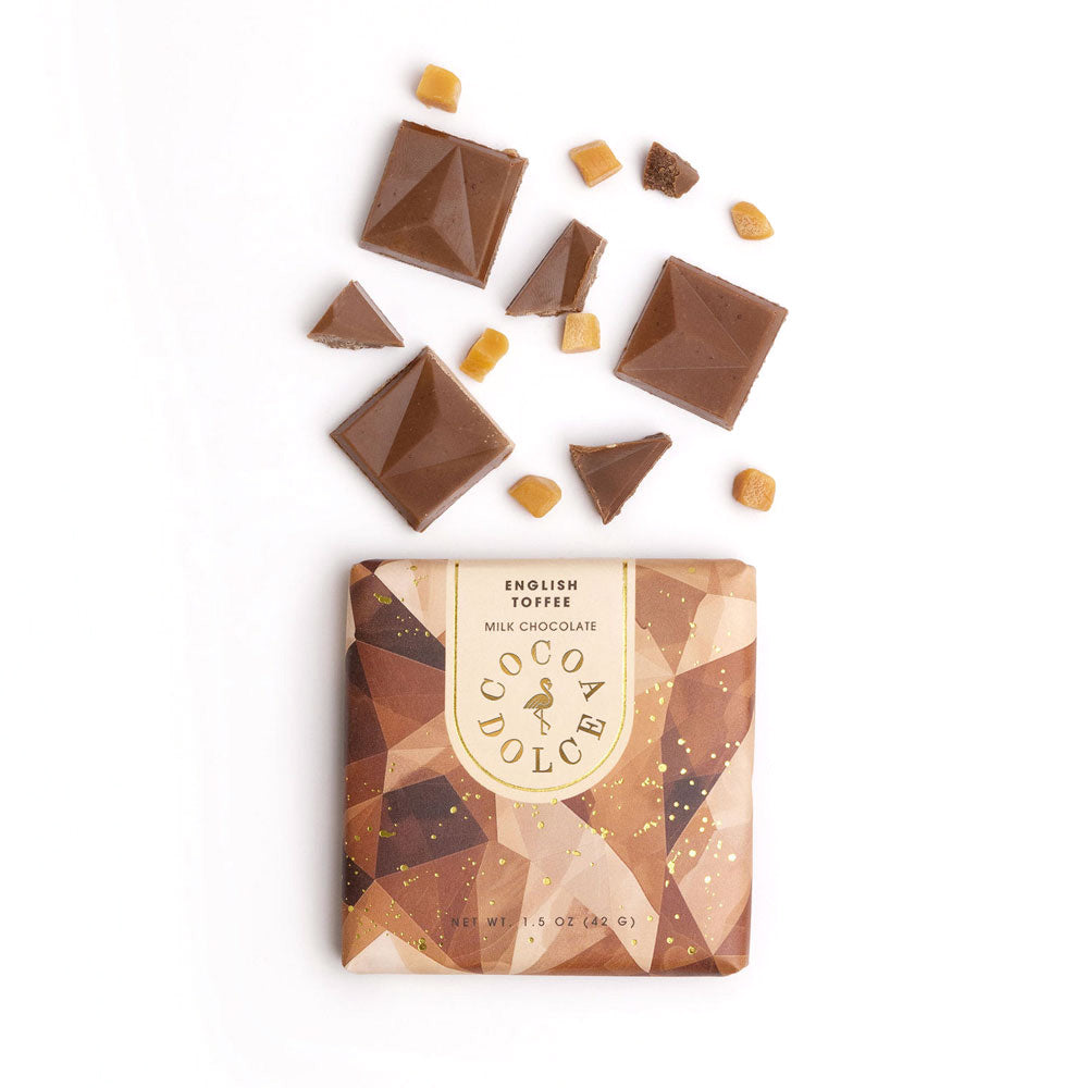 Close up of smooth milk chocolate with crunchy toffee bits